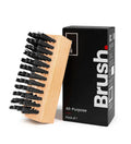 SHOEGR All-purpose shoe brush with black bristles with its packaging on a white background