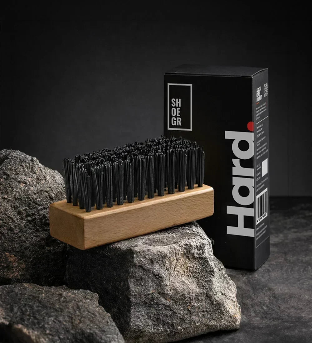 SHOEGR Hard Brush for Cleaning Sneakers and Shoes on a Black Background with its packaging.