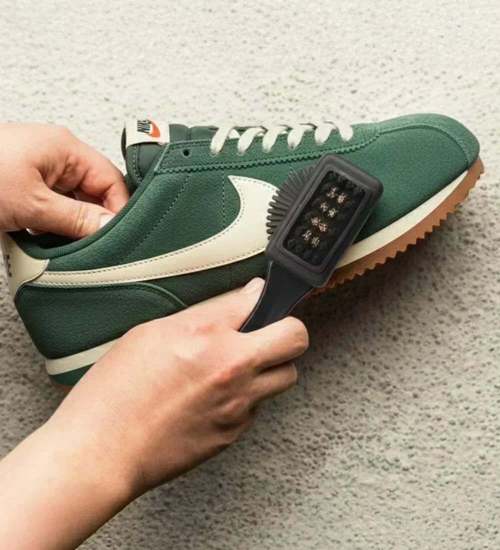 Suede and Nubuck brush cleaning Nike sneaker.