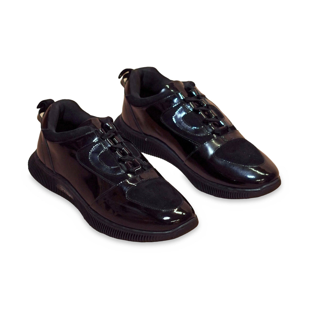 Sportivo | Black patent leather and suede sneakers on white background